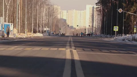 Empty spring road with pedestrians Stock Footage 172417089