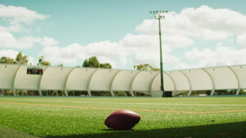 Empty Sprots Field stadium and a football Stock Footage 262314386