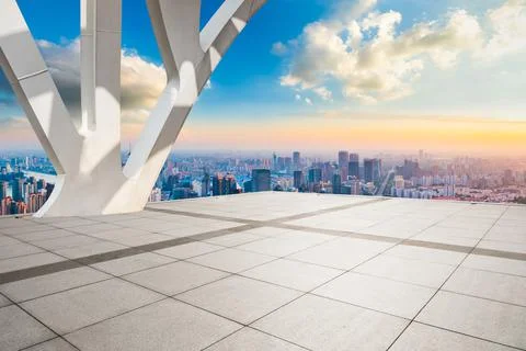 Empty square and city skyline at sunrise in Shanghai. Stock Photos