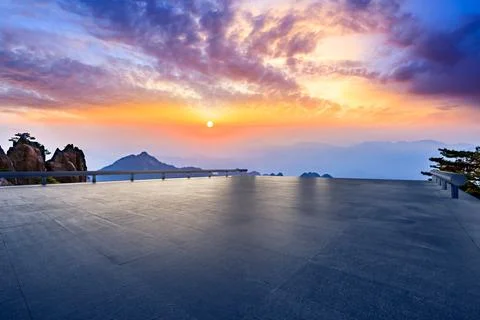 Empty square floor and beautiful Huangshan at sunset in Anhui. Stock Photos