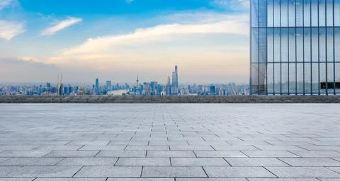 Empty square floor and city skyline with buildings in Shanghai. Stock Photos