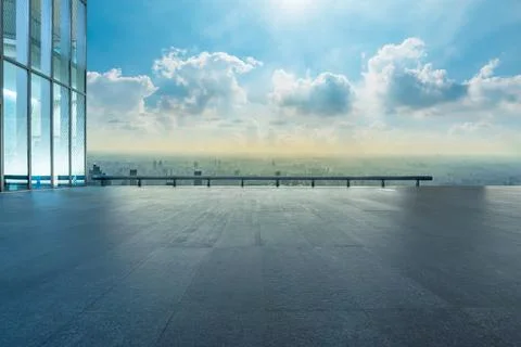 Empty square floor and city skyline at sunset in Shanghai. Stock Photos
