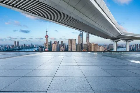 Empty square floor and city skyline with buildings in Shanghai. Stock Photos