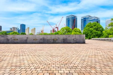 Empty square floor and financial district buildings in Shanghai,China. Stock Photos