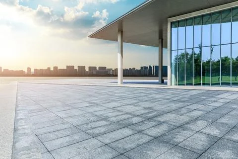 Empty square floor and glass wall building with city skyline in Shanghai Stock Photos