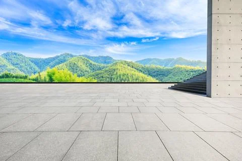 Empty square floor and green mountain with bamboo forest natural landscape. Stock Photos