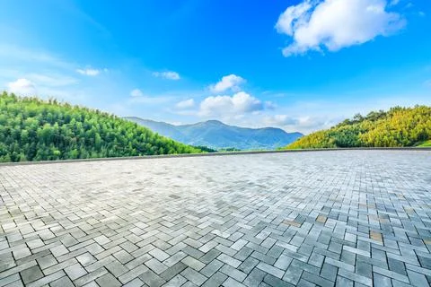 Empty square floor and green mountain with bamboo forest natural landscape. Stock Photos