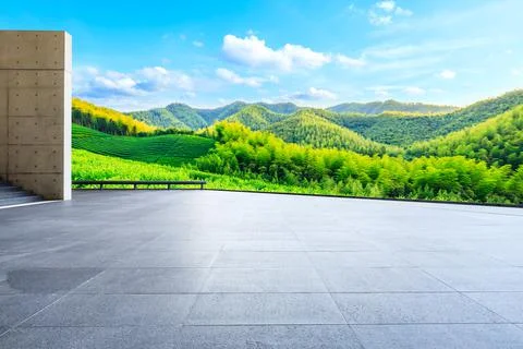 Empty square floor and green mountain with bamboo forest natural landscape. Stock Photos