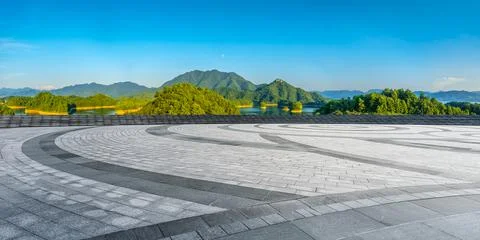 Empty square floor and green mountain with lake nature landscape Stock Photos