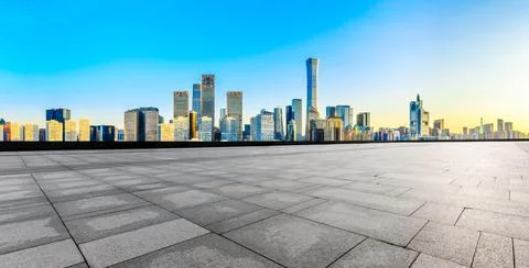 Empty square floor and modern city commercial buildings in Beijing. Stock Photos