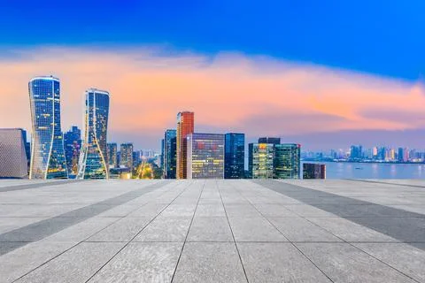 Empty square floor and modern city skyline with buildings in Hangzhou. Stock Photos