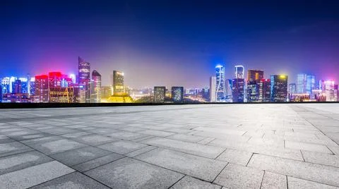 Empty square floor and modern city skyline with buildings in Hangzhou. Stock Photos