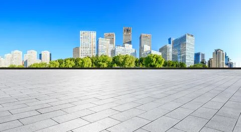 Empty square floor and modern city commercial buildings in Beijing. Stock Photos