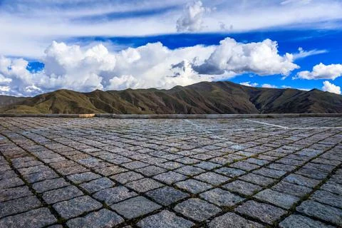 Empty square floor and mountain with sky clouds landscape. Stock Photos