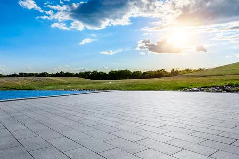 Empty square floor and mountain with sky clouds. Stock Photos