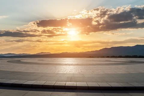 Empty square floor and mountain with sky cloud landscape at sunrise. Stock Photos