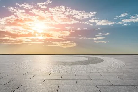 Empty square floor and sky cloud background at sunset. Stock Photos