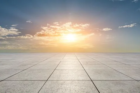 Empty square floor and sky sunset clouds background. Stock Photos