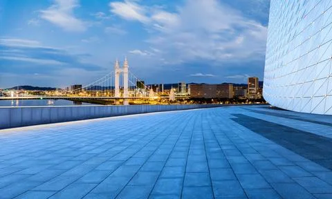 Empty square floor and urban skyline with bridge scenery Stock Photos