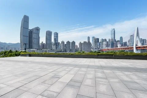 Empty square floor with modern city background Stock Photos