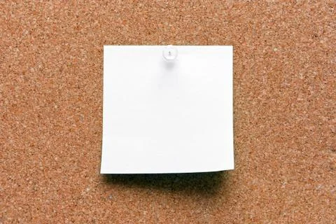 Empty square green pinned sheet on a brown cork reminder Stock Photos
