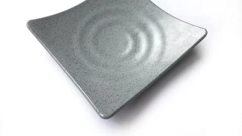 Empty square grey plate with ceramic melamin material Stock Photos