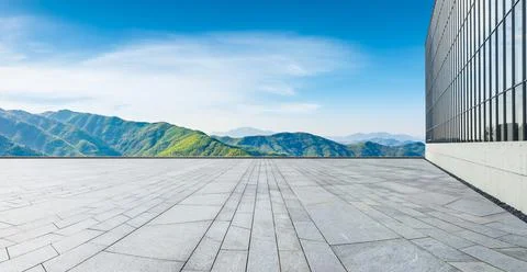 Empty square road and green mountain nature landscape. Stock Photos