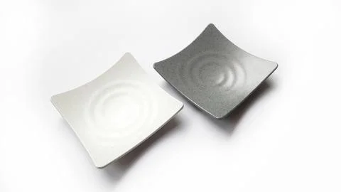 Empty square white and grey plates with ceramic melamin material Stock Photos