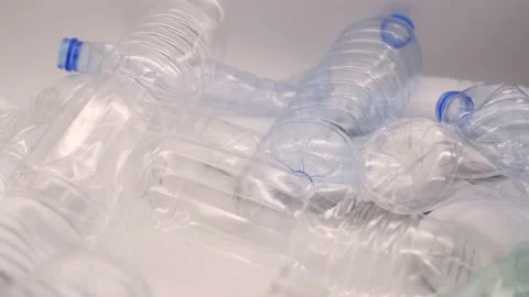 Empty squeezed plastic bottles throw away Stock Footage 133280920