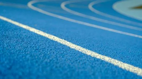 Empty stadium. Colored seats. Row of seats. Treadmill at the stadium. Blue tr Stock Photos