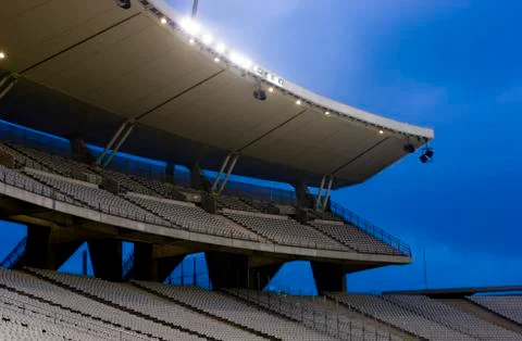 Empty stadium with lights on Stock Photos