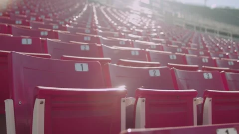 Empty Stadium Seats dolly with sun glare Stock-Footage 253740301