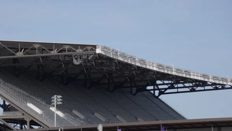 Empty Stadium Stands Under Clear Blue Sky 動画素材 313164290