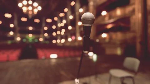 An empty stage with chairs and a microphone Stock Illustration