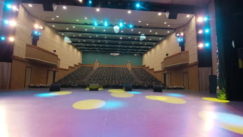 Empty stage at colorful light and auditorium of concert hall Video stock 169660921