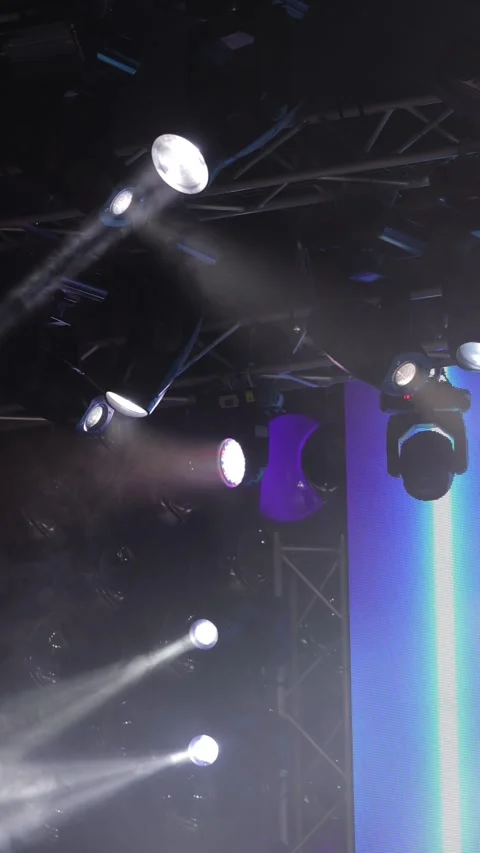 An empty stage of the theater, lit by spotlights and smoke Stock Footage 339024942