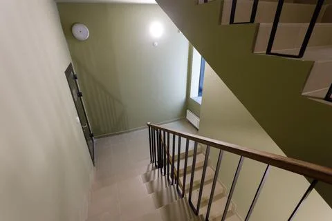 An empty staircase in an office building with no elevator and no people Stock Photos