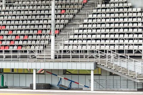Empty stands for fans at the stadium Stock Photos