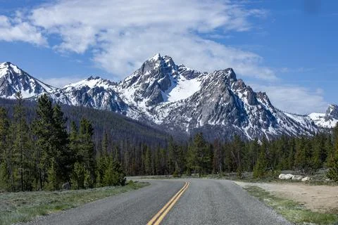 Empty Stanley Lake Road view to McGowan Peak Stock Photos