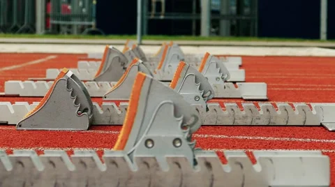 Empty start blocks tartan stadium start Stock Footage 68397630