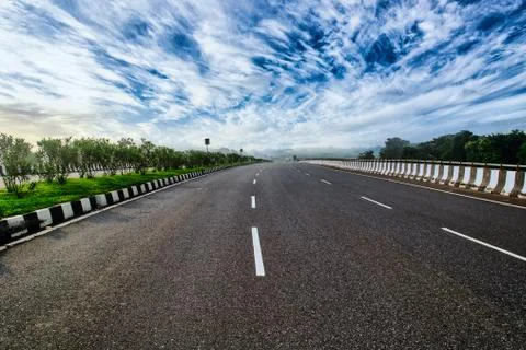 Empty state highway with a dramatic sky in the morning Stock Photos