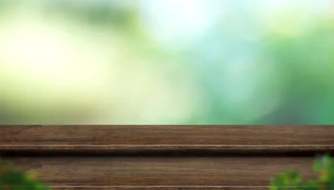 Empty step wood table top with blur tree in park with bokeh light at backgrou Stock Photos