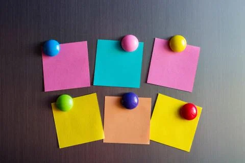Empty stickers for notes on the refrigerator attached with magnets. 写真素材