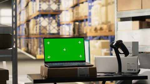 Empty stock room with isolated copy space monitor on workstation Stock Photos