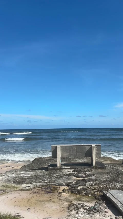 Empty Stone Bench on Rocky Caribbean Shore, Barbados Stock Footage 337972223