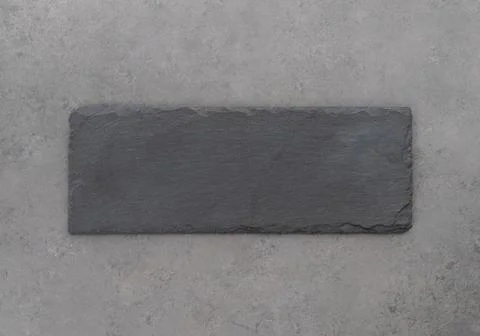 Empty stone board with copy space over stone background Stock Photos