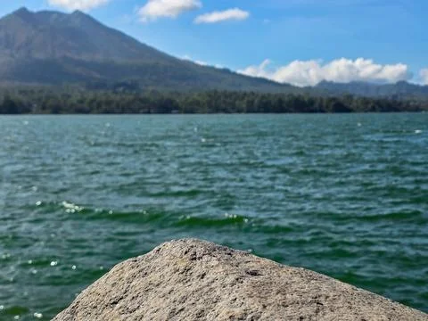 Empty stone with mountain and lake view blurred background, product display 스톡 사진