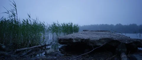 Empty stone pier on lake during foggy day Stock Footage 85848933