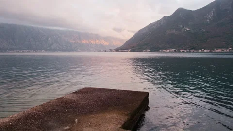 Empty Stone Pier at Perast Beach Facing Kotor Bay, Perast, Montenegro 库存影片 337302759
