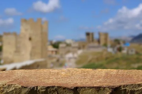 Empty stone table on the background of the old fortress Stock Photos